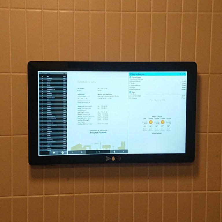 Digital informationstavla i fastighet